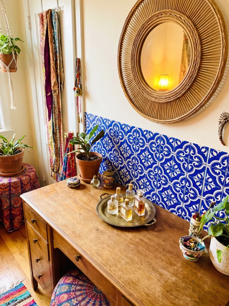 Blue and white Moroccan pattern tile backsplash on a boho vanity